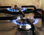 Close up of two gas cooker hobs lit