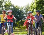 A group of people riding bikes