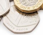 British coins on a white surface