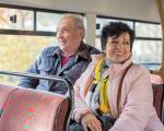 An older couple on a bus