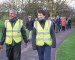 Walking group in high vis vests