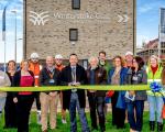 Cllr Mike Bell cutting the ribbon the first show home at Winterstoke Gate in Parklands Village