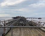 A photo of Birnbeck Pier taken in October 2024 showing the state of disrepair before restoration work starts