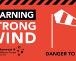  Red weather warning. Strong wind, danger to life. A windsock depicting strong wind