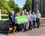 Community holds WESTlocal sign