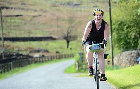 woman cycling on a country road