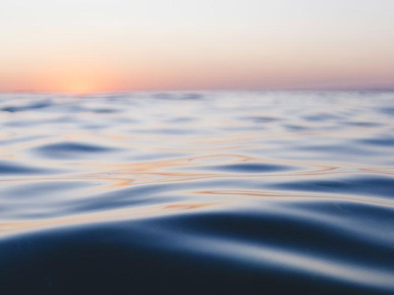 Image shows a close up of a large body of water