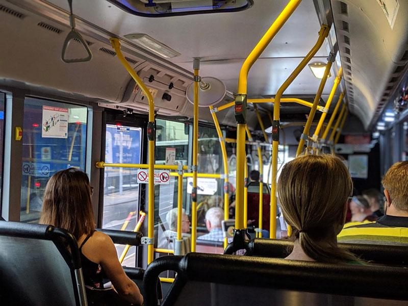 two women sat on a bus