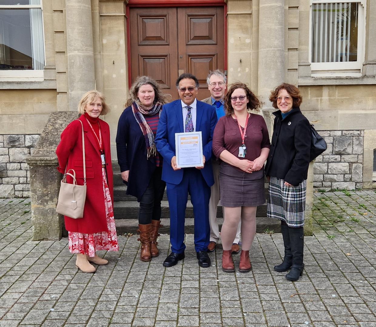 A photo of the Justice SEND Quality Lead award being presented to the North Somerset Youth Offending Service team.