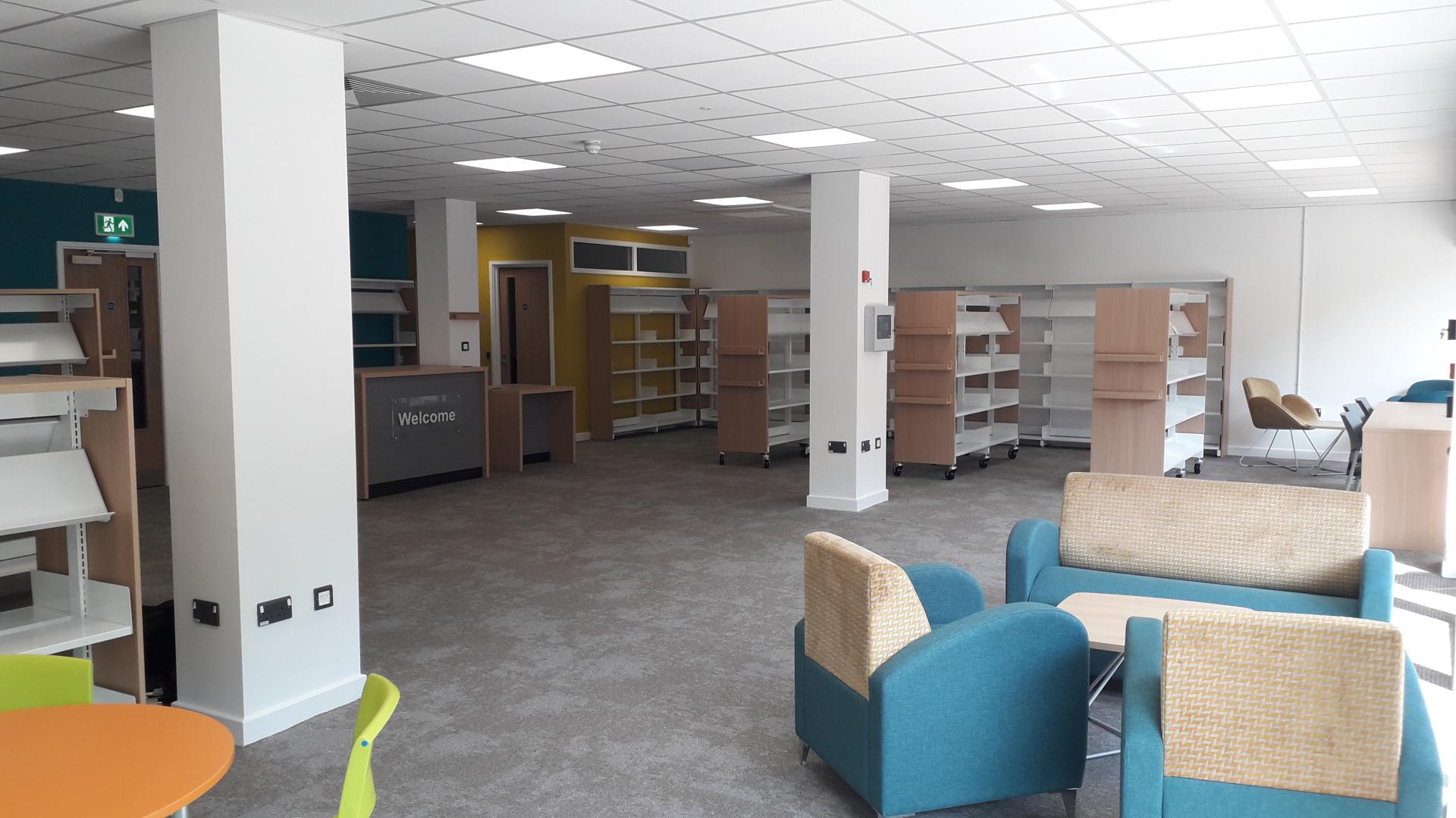 A photo taken inside the new Nailsea Library to show the layout of furniture and location of reception desk in front of the entrance