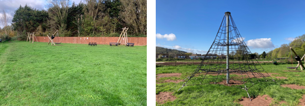 A grass lawn with a new mini spacenet climbing frame added to the play space.