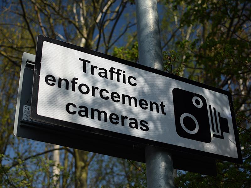 Sign indicating a traffic enforcement camera