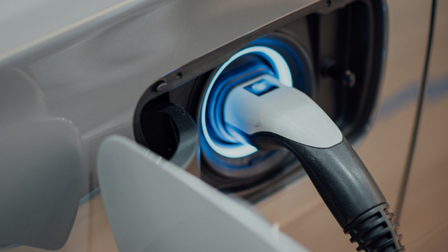 charger plugged into an electric vehicle charging socket