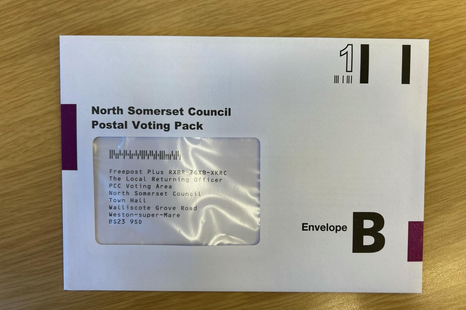 North Somerset Council postal voting pack on a wooden table top