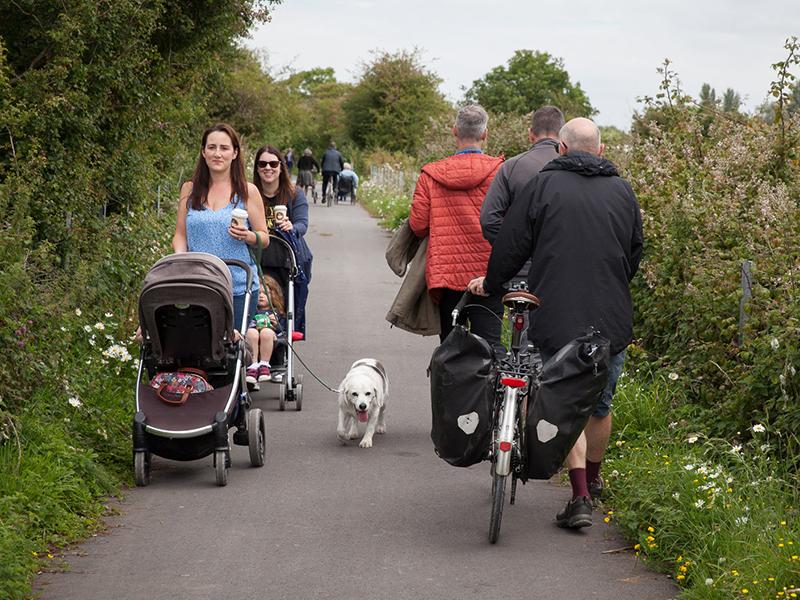 People using Pier to Pier Way cycle path