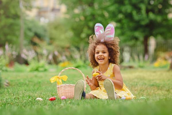 A child dressed in Easter costume